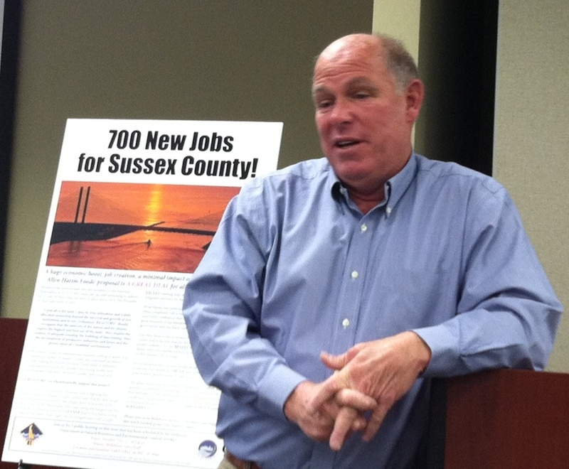 Speaker of the Delaware House of Representatives Rep. Pete Schwartzkopf, D-Rehoboth Beach, speaks to a group of realtors and fellow legislators during a special breakfast at the Sussex County Association of Realtors office in Georgetown. Behind Schwartzkopf is a poster that was designed by SCAOR in support of the Allen-Harim poultry facility in Millsboro. SOURCE SUBMITTED
